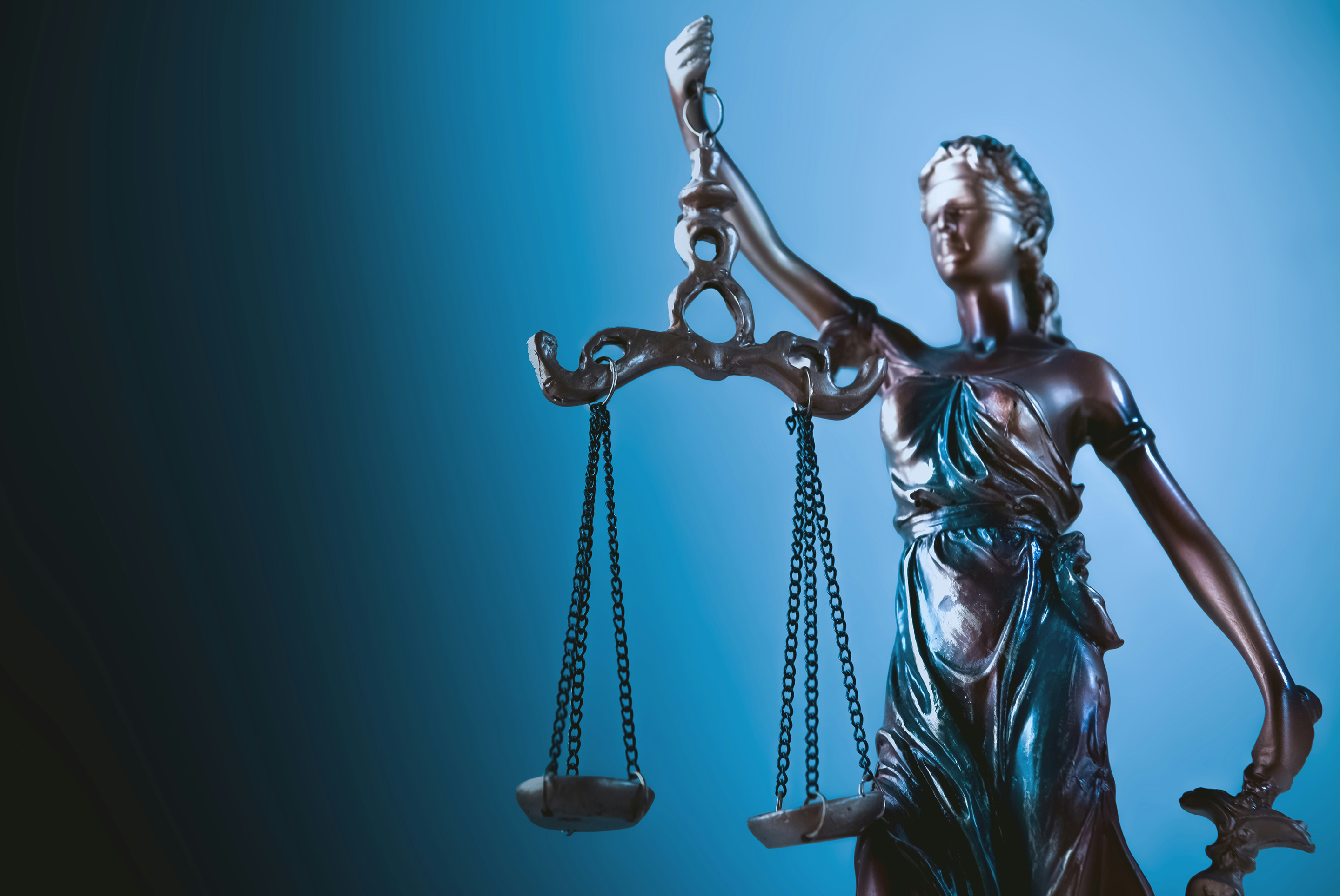 Lady Justice statue holding scale and sword